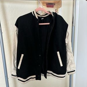 varsity style jacket, with pleather sleeves